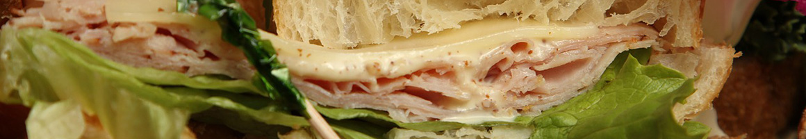 Eating Sandwich Chicken Salad at PDQ Durham restaurant in Durham, NC.